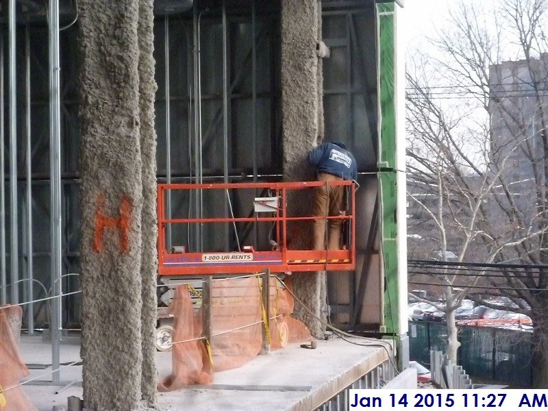 Aligning the stone panels at the 2nd floor Facing East